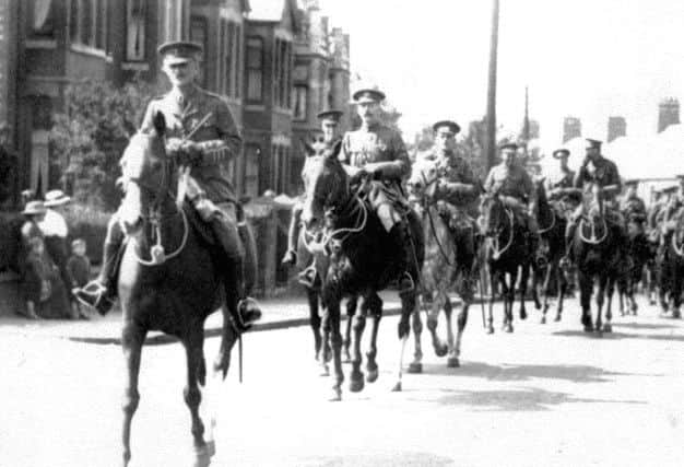This picture taken in 1916 shows soldiers from Melton based at the Remount (now the Defence Animal Centre) going to the western front and the Somme. The picture was taken on Thorpe Road, just before the entrance to the hospital EMN-180725-095142001
