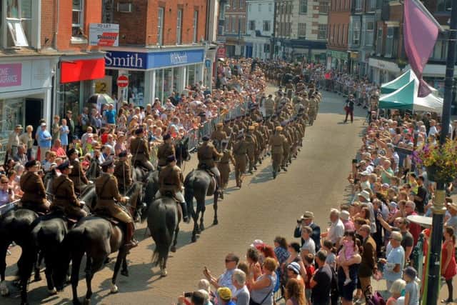 The RAVC centenary parade is greeted by huge crowds in Market Place in Melton EMN-180727-130435001