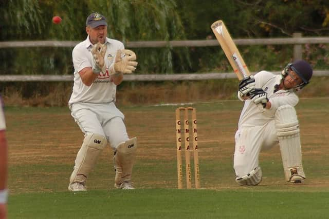 Alex Renwick tries an audacious ramp shot in his huge innings of 182 for Thorpe Arnold Seconds EMN-180731-105800002