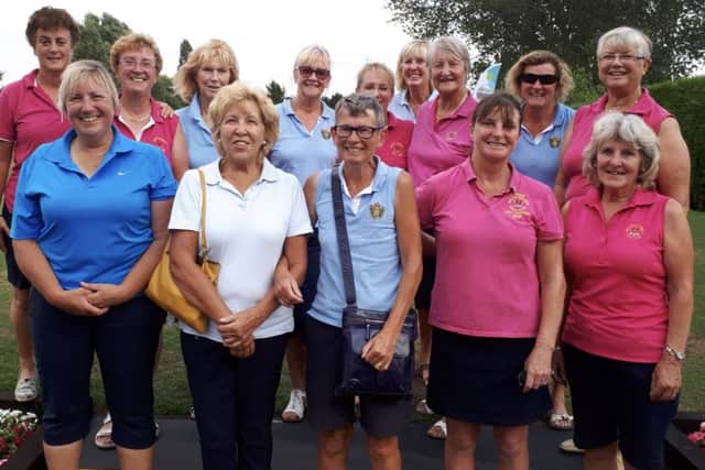 The Melton and Beeston ladies line up before their quarter-final EMN-180731-124550002