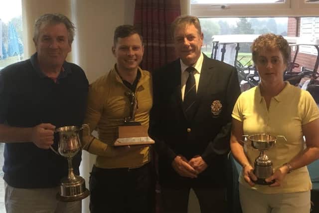 From left, seniors champion Gerry Wright, club champion Sam Pollard, club captain Glenn Price and ladies champion Nancy Denny EMN-180731-172741002