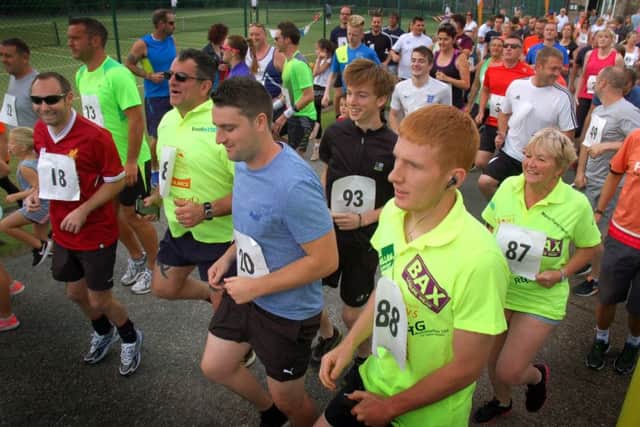 Time for a warm-up before the fun run PHOTO: Tim Williams
