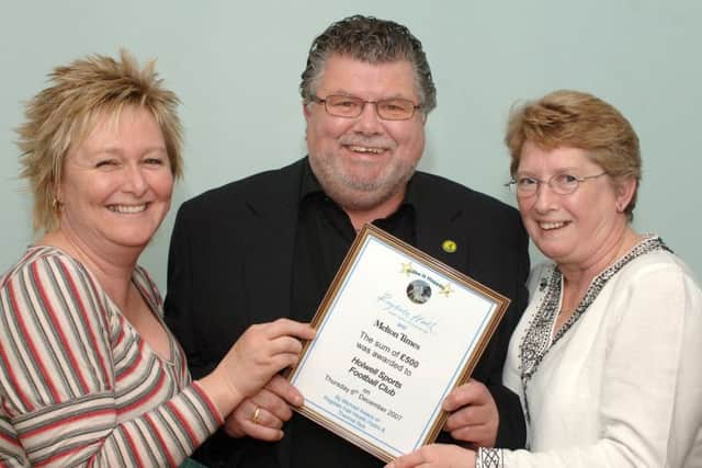 Graham Parker receiving a Melton Times/Ragdale Hall Make it Happen award on behalf of Holwell Sports EMN-180108-131951002