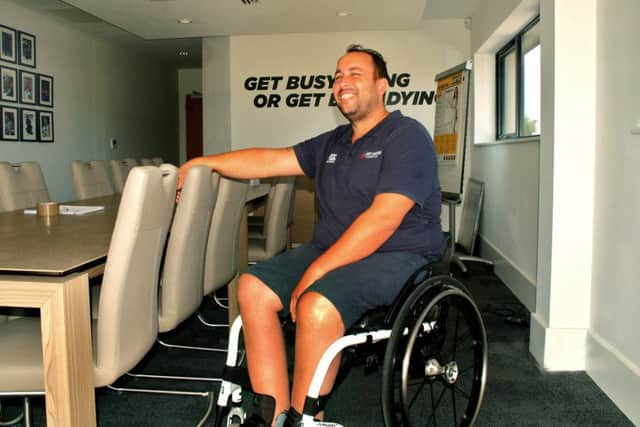 Manager Darrel White tries out one of the gym machines at the Get Busy Living Centre EMN-180608-115237001