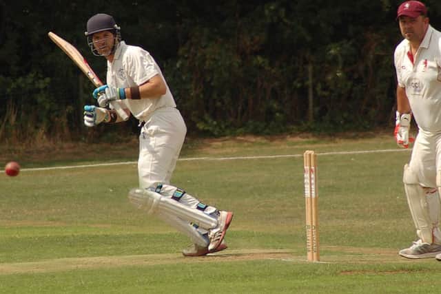 Chris Pole joint top-scored for Syston with 84 as Melton keeper Simon Claricoates looks on EMN-180708-191132002