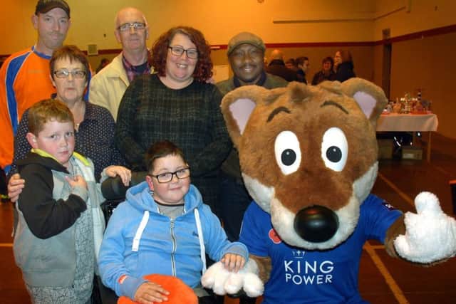 William Billingsley and family with Leicester City mascot Filbert Fox at a charity fundraiser at Asfordby EMN-180808-092652001