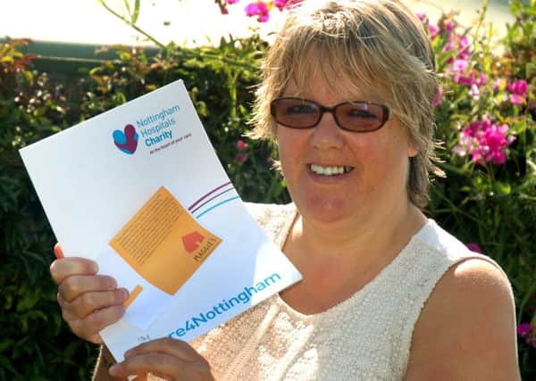 Helen Gardner is preparing to abseil 541ft down a tower to raise money for a hospital which has cared for her partner EMN-180808-162738001