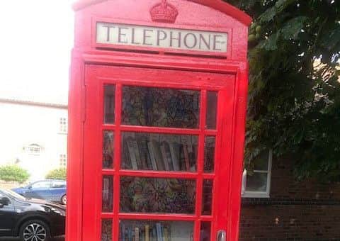 Long Clawson Little Library in the red phone box on The Sands PHOTO: Supplied