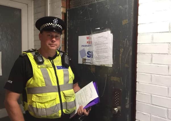 Sgt Mark Williams, of Melton Police, outside a property in Beckmill Court which has been closed down due to numerous incidents of anti-social behaviour EMN-181008-092859001