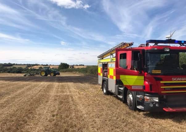 Firefighters tackle a field blaze at Burrough-on-the-hill
PHOTO LEICS FIRE SERVICE EMN-180813-115130001