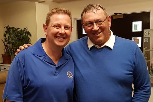 Melton team vice-captain Neil Eaves (left) with Kibworth B teams stand-in skipper EMN-180814-123514002