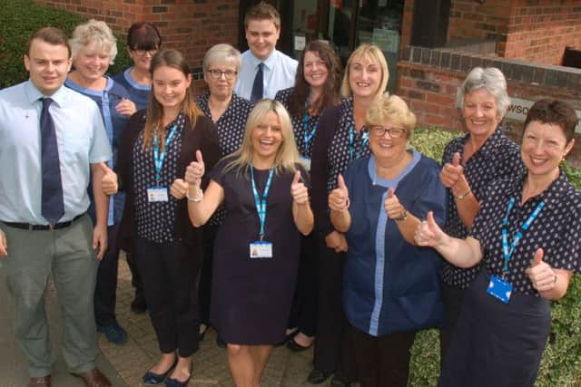 Staff at Long Clawson Medical Practice celebrate their impressive patient survey results EMN-180822-121921001