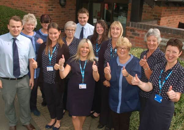 Staff at Long Clawson Medical Practice celebrate their impressive patient survey results EMN-180822-121921001
