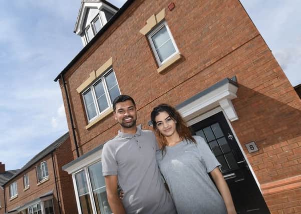Davina and Liam Patel outside their Wainwright home PHOTO: Supplied