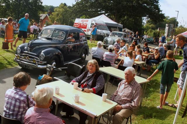 A parade of vintage vehicles at Old Dalby Day PHOTO: Tim Williams