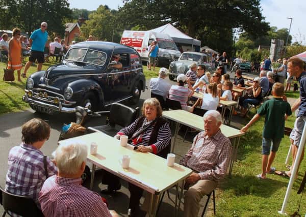 A parade of vintage vehicles at Old Dalby Day PHOTO: Tim Williams
