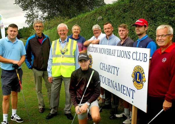 Melton Lions President Conroy Godber greets golfers at the first tee EMN-180822-100020002