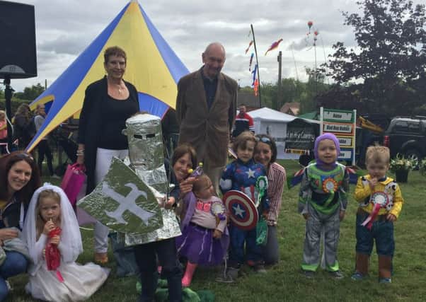 Winning knight Joshua Nicholson with children who entered the fancy dress competition PHOTO: Jim Patman