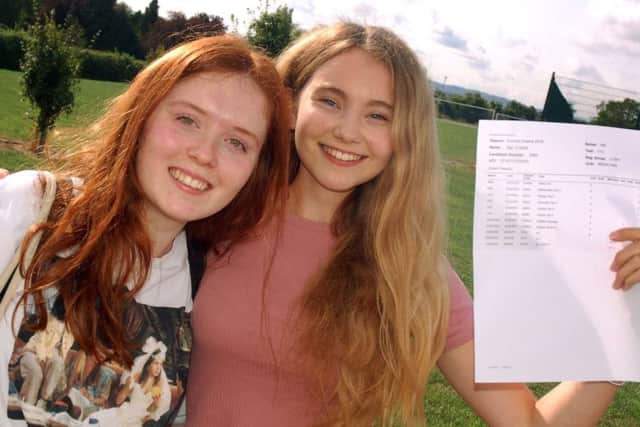 Amy Healey and Mia Forks celebrate their GCSE results at John Ferneley College EMN-180828-092836001
