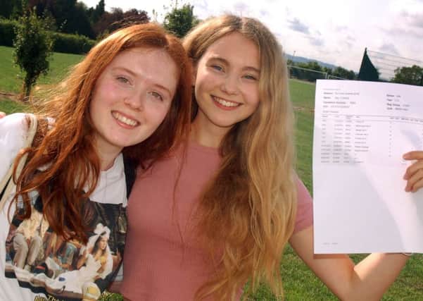 Amy Healey and Mia Forks celebrate their GCSE results at John Ferneley College EMN-180828-092836001
