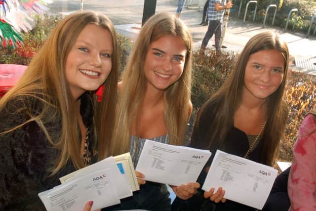 Long Field Academy students get their GCSE results - Amy Barnard with sisters Lucy and Ella Thomas EMN-180828-145746001