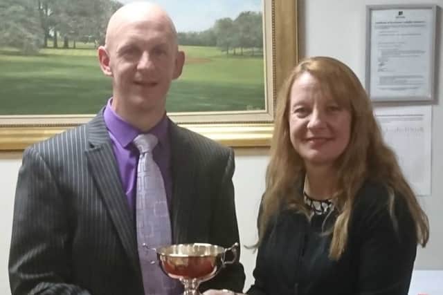 Mixed Open winners Steve and Penny Hallam with the Bill Roope Cup EMN-180828-150331002