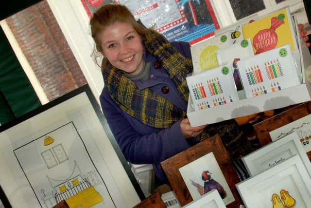 Becca Simmons with some of her Beccas Design illustrations PHOTO: Tim Williams
