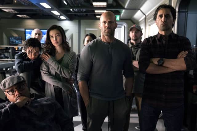 Page Kennedy as DJ, Ruby Rose as Jaxx, Li Bingbing as Suyin, Jason Statham as Jonas Taylor and Cliff Curtis as Mac PHOTO: PA Photo/Warner Bros/Entertainment Inc/RatPac-Dune Entertainment LLC/Daniel Smith