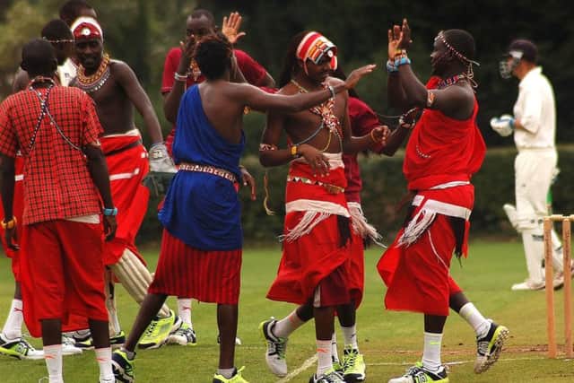 The Maasai Warriors celebrate taking a wicket during their match against the Duchess of Rutland XI at Knipton EMN-180309-124954001