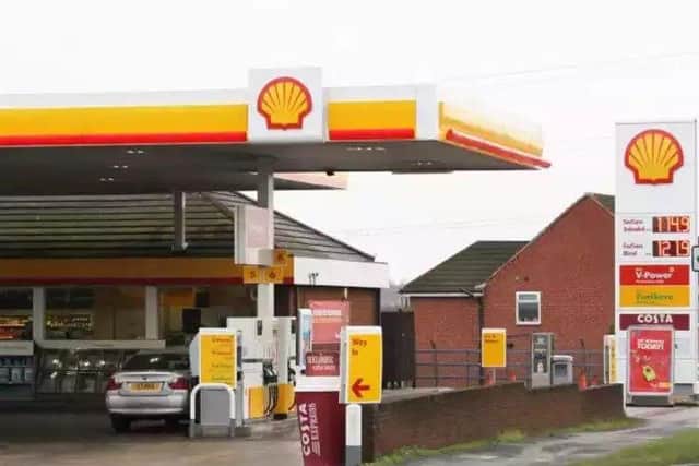 Is it illegal to leave your child alone in the car while youre at a petrol station?