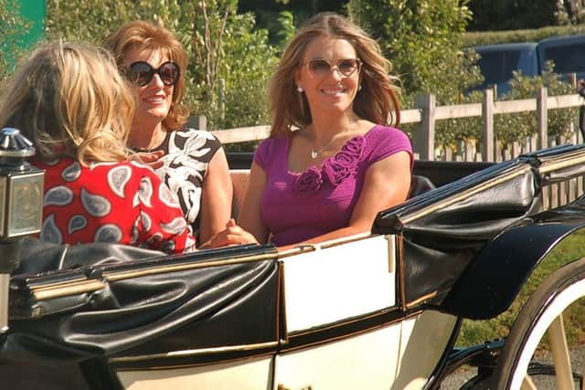 Elizabeth Hurley, Susannah Constantine and the Duchess of Rutland arrive in a horse-drawn carriage at the official opening of The Engine Yard retail park at Belvoir Castle
PHOTO TIM WILLIAMS EMN-180309-115237001