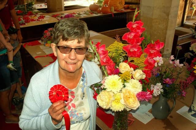 Mary Briant with her winning vase of garden flowers PHOTO: Tim Williams
