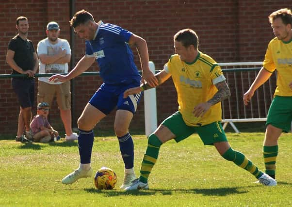 Harry Thompson gets in a new challenge in Holwell's early FA Vase exit EMN-180409-101943002