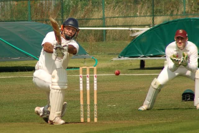 The Ashby bowler beats Pete Humphries' bat as Melton First XI were defeated by the Division Three leaders EMN-180409-121007002