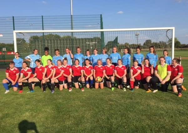 Asfordby Amateurs Under 14s with Canadian touring side Happy Valley-Goose Bay EMN-180509-095547002
