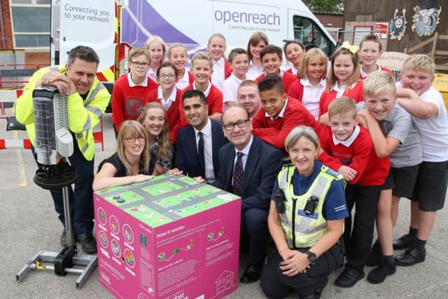 Pupils at Brownlow Primary School, in Melton, prepare to try out a new interactive learning resource about broadband internet with police and BT engineers in attendance to give them advice EMN-180709-125449001