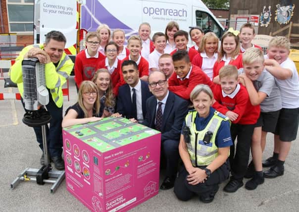 Pupils at Brownlow Primary School, in Melton, prepare to try out a new interactive learning resource about broadband internet with police and BT engineers in attendance to give them advice EMN-180709-125449001