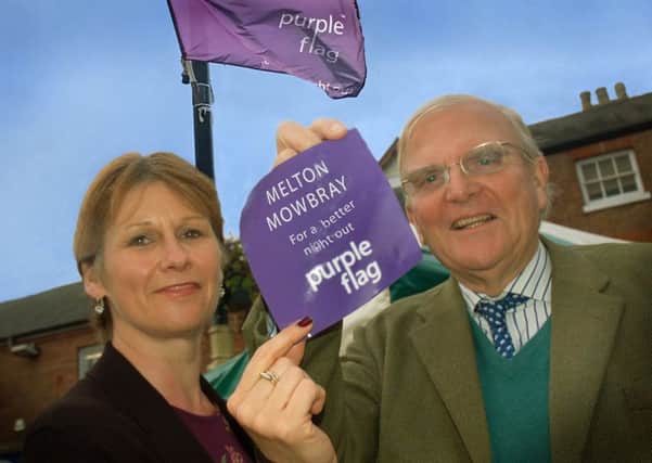Melton BID manager Shelagh Core and Councillor Malise Graham, chairman of the Melton Safer Partnership group, celebrate the retention of Melton's coveted Purple Flag status EMN-181109-125358001