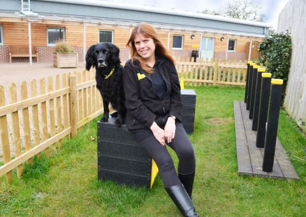 Sarah Saunders, education and community officer, with her dog Lyra PHOTO: Supplied