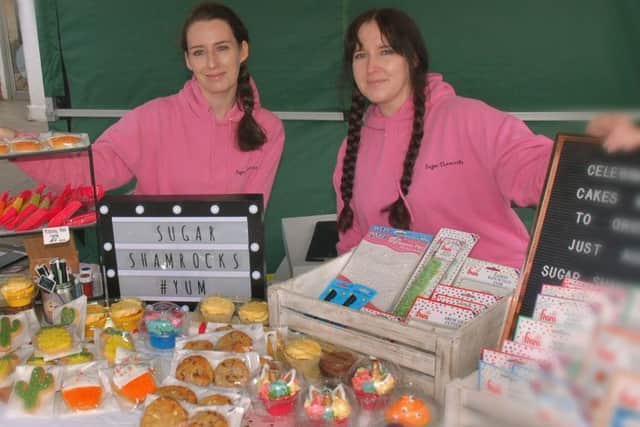 Dionne and Naomi Yeandle display some sweet treats from Sugar Shamrocks.
