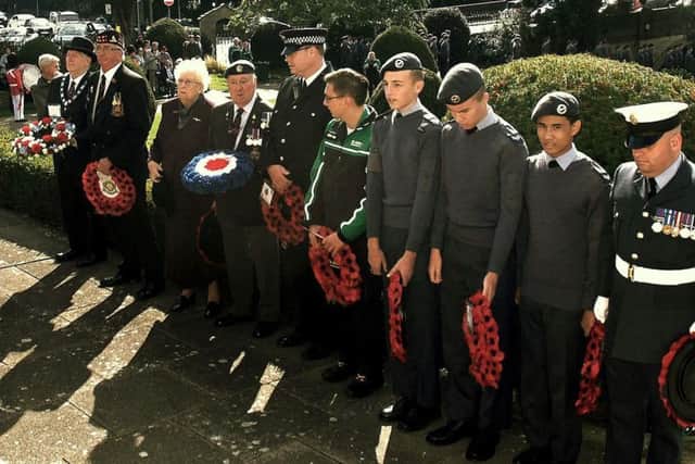 Wreaths are layed in the Memorial Gardens EMN-180917-124315001