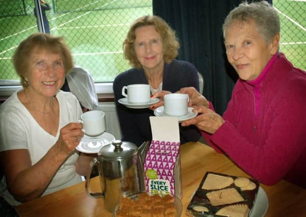 Hamilton Tennis Club ladies Pat Woolston, Jill Luke and Mary Farmer enjoy a cuppa together for Macmillan PHOTO: Tim Williams