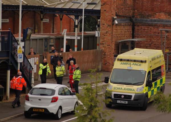 The emergency services at Melton Railway Station after reports of a man jumping from the railway bridge on Burton Street EMN-180924-112013001