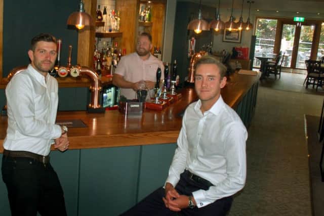 England cricketer Stuart Broad right) with Notts CCC team-mate Harry Gurney sitting at the bar of their new pub - the Tap and Run at Upper Broughton EMN-180924-145022001