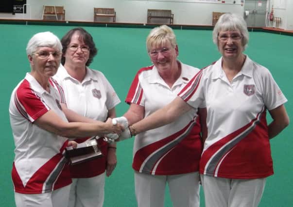 Novice Ladies Pairs winners Cheryl Rawle and Julie Kipling (left), with Pat Wright and Yvonne Kent EMN-180925-154228002