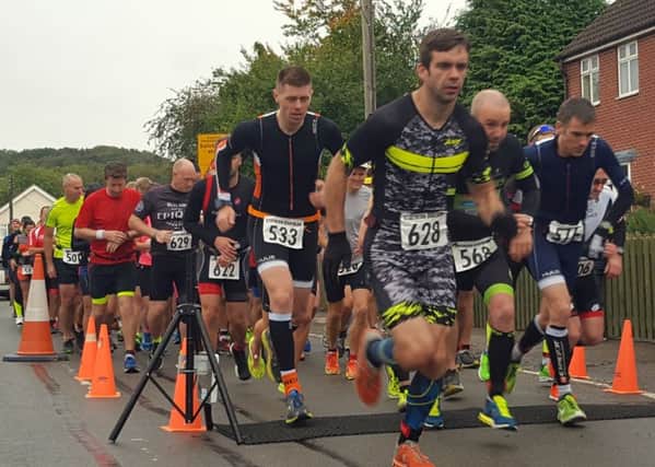 Race winner Thomas Marshall leads the pack from the start EMN-180927-104146002