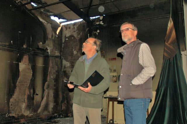 Chairman Brian Keevil and treasurer Ian Smith inspect the fire damage at Hose village hall EMN-180110-111002001