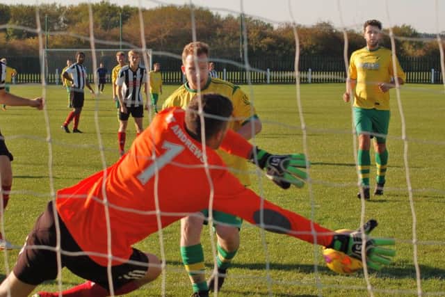Ben Betteridge taps in the winner after seeing his initial penalty attempt saved EMN-180210-112418002