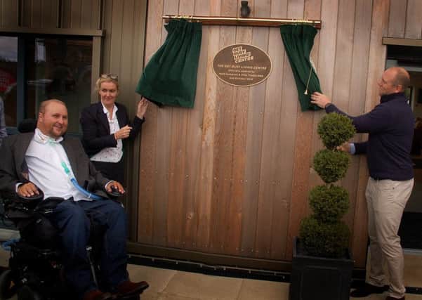 Unveiling of the plaque at the official opening of the Get Busy Living centre at Burrough on the Hill EMN-180210-172412001