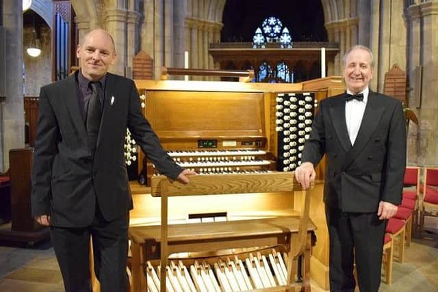 Jonathan Wallace and Paul Hale by the Sir Malcolm Sargent Memorial Organ in St Mary's Church PHOTO: Supplied